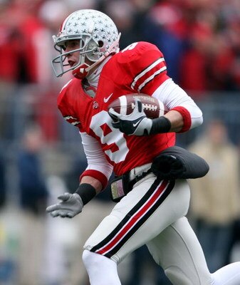 COLUMBUS, OH - NOVEMBER 22:  Brian Hartline #9 of the Ohio State Buckeyes catches a pass for a touchdown during the Big Ten Conference game against the Michigan Wolverines at Ohio Stadium on November 22, 2008 in Columbus, Ohio.  (Photo by Andy Lyons/Getty