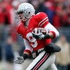 COLUMBUS, OH - NOVEMBER 22:  Brian Hartline #9 of the Ohio State Buckeyes catches a pass for a touchdown during the Big Ten Conference game against the Michigan Wolverines at Ohio Stadium on November 22, 2008 in Columbus, Ohio.  (Photo by Andy Lyons/Getty