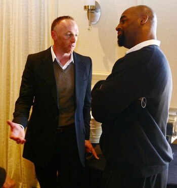 TAMPA, FL - JANUARY 31:  Jeff Garcia (L) talks with Donovan McNabb at the launch of the Isaac Daniel, ID Coach at the Sheraton Riverwalk on January 31, 2009 in Tampa, Florida. The ID Coach system allows coaches to communicate plays to players without usin