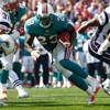 FOXBORO, MA - SEPTEMBER 21: Ronnie Brown #23 of the Miami Dolphins runs for a touchdown against the New England Patriots at Gillette Stadium on September 21, 2008 in Foxboro, Massachusetts. The Dolphins won 38-13. (Photo by Jim Rogash/Getty Images)