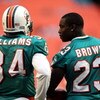 MIAMI - AUGUST 23: Running backs Ricky Williams #34 and Ronnie Brown #23 of the Miami Dolphins chat prior to a preseason game against the Kansas City Chiefs on August 23, 2008 at Dolphin Stadium in Miami, Florida.  (Photo by Marc Serota/Getty Images)