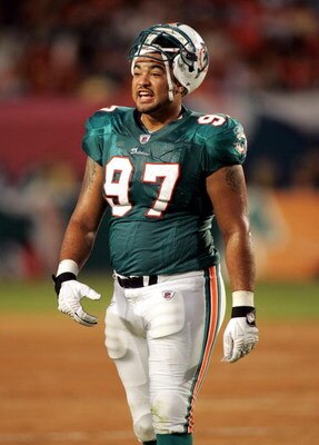 MIAMI - AUGUST 09:  Defensive end Philip Merling #97 of the Miami Dolphins during a pre season game against the Tampa Bay Buccaneers on August 9, 2008 at Dolphin Stadium in Miami, Florida. Tampa defeated Miami 17-6.  (Photo by Marc Serota/Getty Images)