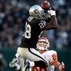 OAKLAND, CA - NOVEMBER 30:  Gibril Wilson #28 of the Oakland Raiders breaks up a pass to Tony Gonzalez #88 of the Kansas City Chiefs during an NFL game on November 30, 2008 at the Oakland-Alameda County Coliseum in Oakland, California.  (Photo by Jed Jaco