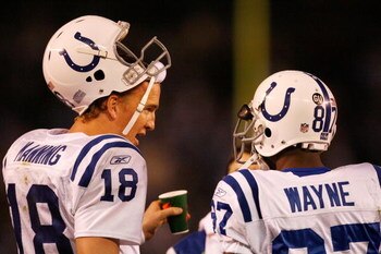 SAN DIEGO - JANUARY 03:  Wide receiver Reggie Wayne #87 of the Indianapolis Colts talks with quaterback Peyton Manning #18 during the AFC Wild Card Game against the San Diego Chargers on January 3, 2009 at Qualcomm Stadium in San Diego, California.  (Phot