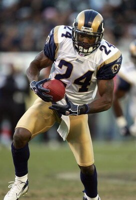 OAKLAND, CA - DECEMBER 17: Ron Bartell #24 of the St. Louis Rams carries the ball during the game against the Oakland Raiders at McAfee Coliseum December 17, 2006 in Oakland, California. (Photo by Jed Jacobsohn/Getty Images)