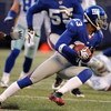 EAST RUTHERFORD, NJ - NOVEMBER 02:  Corey Webster #23 of the New York Giants runs back an interception against the Dallas Cowboys and Aaron Ross #31 follow during their game on November 2, 2008 at Giants Stadium in East Rutherford, New Jersey.  (Photo by 