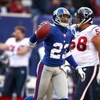 EAST RUTHERFORD, NJ - NOVEMBER 05:  Corey Webster #23 of the New York Giants recovers a fumble in the fourth Quarter against the Houston Texans on November 5, 2006 at Giants Stadium in East Rutherford, New Jersey. The Giants defeated the Texans 14-10.  (P