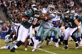 PHILADELPHIA - DECEMBER 28:  Correll Buckhalter #28 of the Philadelphia Eagles runs the ball against Anthony Spencer #93 of the Dallas Cowboys on December 28, 2008 at Lincoln Financial Field in Philadelphia, Pennsylvania. The Eagles defeated the Cowboys 4
