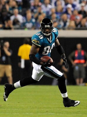 JACKSONVILLE, FL - DECEMBER 18:  Marcedes Lewis #89 of the Jacksonville Jaguars runs for yardage during the game against the Indianapolis Colts at Jacksonville Municipal Stadium on December 18, 2008 in Jacksonville, Florida.  (Photo by Sam Greenwood/Getty