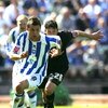 BRIGHTON, UNITED KINGDOM - MAY 02: Doug Loft of Brighton & Hove Albion and Matty Mainwaring of Stockport County run to the ball during the Coca Cola League One match between Brighton & Hove Albion and Stockport County at Withdean Stadium on May 02, 2009 i