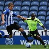 SHEFFIELD, UNITED KINGDOM - AUGUST 02:  Henri Camara of Wigan Athletic holds off Mark Beevers of Sheffield Wednesday (L) during the pre season friendly match between Sheffield Wednesday and Wigan Athletic at Hillsborough on August 2, 2008 in Sheffield, En