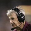 LANDOVER, MD - AUGUST 28:  Head Coach Frank Beamer of the Virginia Tech Hokies looks on against the University of Southern California Trojans during the Black Coaches Association Football Classic on August 28, 2004 at FedEx Field in Landover, Maryland.  U