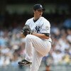 NEW YORK - APRIL 18:  Chien-Ming Wang #40  of the New York Yankees pitches against the Cleveland Indians at Yankee Stadium on April 18, 2009 in the Bronx borough of New York City.  (Photo by Nick Laham/Getty Images)