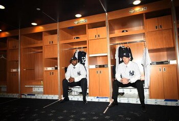 NEW YORK - DECEMBER 18:  CC Sabathia and A.J. Burnett pose for photographers after a press conference to announce their signing to the New York Yankees at Yankee Stadium on December 18, 2008  in the Bronx borough of New York City.  (Photo by Nick Laham/Ge