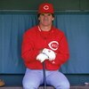 1986:  Pete Rose of the Cincinnati Reds sits in the dug-out during a MLB game in the 1986 season. ( Photo by: Stephen Dunn/Getty Images)