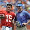 GAINESVILLE, FL - APRIL 18: Quarterback Tim Tebow #15 of the University of Florida talks with quarterbacks coach Scott Loeffler  during the spring football Orange and Blue game April 18, 2009 at Ben Hill Griffin Stadium in Gainesville, Florida.  (Photo by