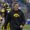 IOWA CITY, IOWA - NOVEMBER 8: Head Coach Kirk Ferentz of the Iowa Hawkeyes runs his team through warm up drills before taking on the  Penn State Nittany Lions at Kinnick Stadium on November 8, 2008 in Iowa City, Iowa. Iowa defeated Penn State  24-23. (Pho