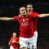 MANCHESTER, UNITED KINGDOM - MARCH 11:  Nemanja Vidic of Manchester United celebrates scoring the opening goal with team mate Rio Ferdinand (R) during the UEFA Champions League Round of Sixteen, Second Leg match between Manchester United and Inter Milan a