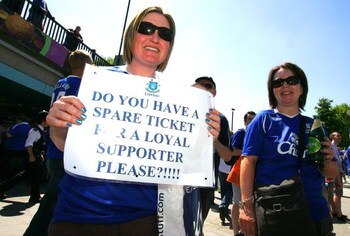 LONDON, ENGLAND - MAY 30:  An Everton fan hopes to get hold of a ticket prior to the FA Cup sponsored by E.ON Final match between Chelsea and Everton at Wembley Stadium on May 30, 2009 in London, England. (Photo by Tom Dulat/Getty Images)