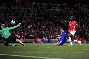 LONDON, ENGLAND - MAY 05:  Cristiano Ronaldo of Manchester United shoots and scores the third goal of the game during the UEFA Champions League Semi Final Second Leg match between Arsenal and Manchester United at Emirates Stadium on May 5, 2009 in London,