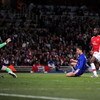 LONDON, ENGLAND - MAY 05:  Cristiano Ronaldo of Manchester United shoots and scores the third goal of the game during the UEFA Champions League Semi Final Second Leg match between Arsenal and Manchester United at Emirates Stadium on May 5, 2009 in London,