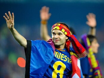 BARCELONA, SPAIN - MAY 28:  Andres Iniesta celebrates at the Nou Camp stadium the day after Barcelona won the UEFA Champions League Cup final on May 28, 2009 in Barcelona, Spain. Barcelona beat Manchester United in the final in Rome.  (Photo by Manuel Que