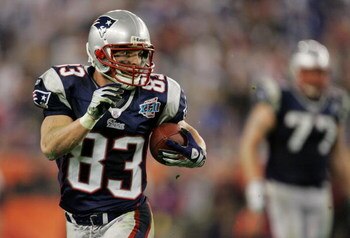 GLENDALE, AZ - FEBRUARY 03:  Wes Welker #83 of the New England Patriots runs the ball in the fourth quarter of Super Bowl XLII against the New York Giants on February 3, 2008 at the University of Phoenix Stadium in Glendale, Arizona.  (Photo by Streeter L
