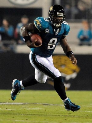 JACKSONVILLE, FL - DECEMBER 18: David Garrard #9 of the Jacksonville Jaguars runs for yardage during the game against the Indianapolis Colts at Jacksonville Municipal Stadium on December 18, 2008 in Jacksonville, Florida.  (Photo by Sam Greenwood/Getty Im