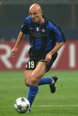 MILAN, ITALY - OCTOBER 22:  Esteban Cambiasso of Inter Milan runs with the ball during the UEFA Champions League Group B match between Inter Milan and Anorthosis Famagusta at the Stadio Giuseppe Meazza on October 22, 2008 in Milan, Italy.  (Photo by Hamis