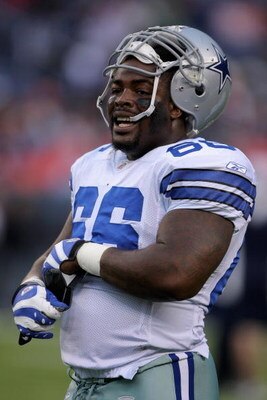 DENVER - AUGUST 16:  Nose tackle Tank Johnson #66 of the Dallas Cowboys warms up prior to facing the Denver Broncos during preseason NFL action at Invesco Field at Mile High on August 16, 2008 in Denver, Colorado. The Broncos defeated the Cowboys 23-13.  