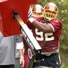ASHBURN, VA - MAY 1:  Albert Haynesworth #92 of the Washington Redskins runs through drills during minicamp on May 1, 2009 at Redskins Park in Ashurn, Virginia.   (Photo by Mitchell Layton/Getty Images)