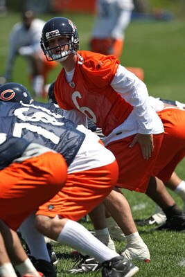 LAKE FOREST, IL - MAY 20: Jay Cutler #6 of the Chicago Bears signals to a wide receiver during an organized team activity (OTA) practice on May 20, 2009 at Halas Hall in Lake Forest, Illinois. (Photo by Jonathan Daniel/Getty Images)