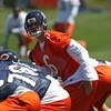 LAKE FOREST, IL - MAY 20: Jay Cutler #6 of the Chicago Bears signals to a wide receiver during an organized team activity (OTA) practice on May 20, 2009 at Halas Hall in Lake Forest, Illinois. (Photo by Jonathan Daniel/Getty Images)