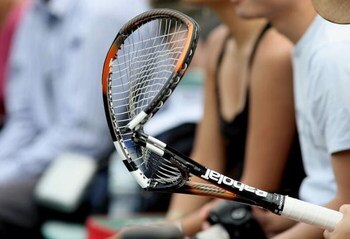 LONDON - JUNE 29:  Fernando Gonzalez of Chile hands a member of the crowd his broken raquet during his match against Marat Safin of Russia during day four of the Wimbledon Lawn Tennis Championships at the All England Lawn Tennis and Croquet Club on June 2