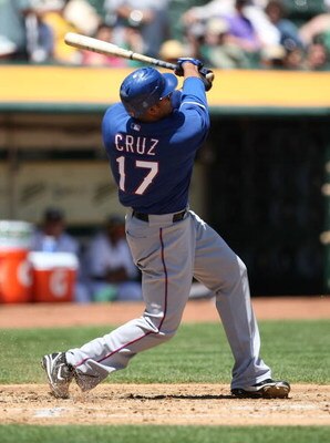 OAKLAND, CA - MAY 07:  Nelson Cruz #17 of the Texas Rangers bats against the Oakland Athletics during a Major League Baseball game on May 7, 2009 at the Oakland Coliseum in Oakland, California.  (Photo by Jed Jacobsohn/Getty Images)
