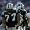 CHARLOTTE, NC - NOVEMBER 16: Kris Jenkins #77 of the Carolina Panthers dances after a sack against the Washington Redskins on November 16, 2003 at Ericsson Stadium in Charlotte, North Carolina.  (Photo by Craig Jones/Getty Images)