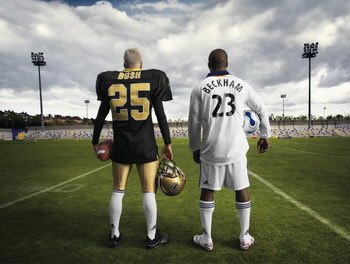 CARSON, CA - JULY 11:  In this handout photo provided by Adidas, LA Galaxy star signing David Beckham and New Orleans Saints star Reggie Bush swap kits as they launch the new LA Galaxy strip on July 11, 2007 in Carson, California. (Photo by Adidas via Get