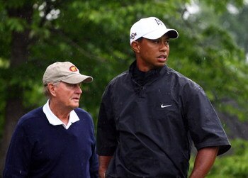 DUBLIN, OH - JUNE 03:  Tiger Woods watches a tee shot as Jack Nicklaus looks on during a skins game prior to the start of the Memorial Tournament at the Muirfield Village Golf Club on June 3, 2009 in Dublin, Ohio.  (Photo by Scott Halleran/Getty Images)