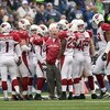 SEATTLE - NOVEMBER 16:  Special teams coach Kevin Spencer of the Arizona Cardinals huddle with his team on the field during the game against the Seattle Seahawks on November 16, 2008 at Qwest Field in Seattle, Washington. (Photo by Otto Greule Jr/Getty Im