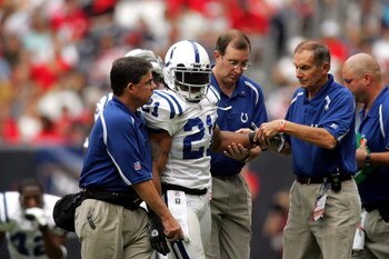 HOUSTON - OCTOBER 23:  Defensive back Bob Sanders #21 of the Indianapolis Colts leaves the field after an injury during play against the Houston Texans on October 23, 2005 at Reliant Stadium in Houston, Texas. The Colts defeated the Texans 38-20.  (Photo 
