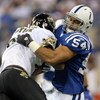 INDIANAPOLIS - DECEMBER 02: Freddy Keiaho #54 of the Indianapolis Colts tackles Fred Taylor #28 of the Jacksonville Jaguars during the NFL game against  on December 2, 2007 at the RCA Dome in Indianapolis, Indiana.  (Photo by Andy Lyons/Getty Images)  