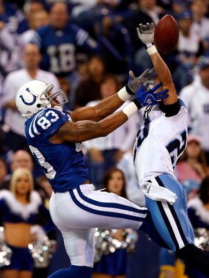 INDIANAPOLIS - DECEMBER 28:  Chris Carr #29 of the Tennessee Titans breaks up a pass intended for receiver Roy Hall #83 of the Indianapolis Colts during the game at Lucas Oil Stadium December 28, 2008 in Indianapolis, Indiana.  (Photo by Jamie Squire/Gett