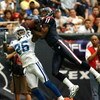 HOUSTON - SEPTEMBER 23:  Wide receiver Jerome Mathis #11 of the Houston Texans leaps for a reception over defensive back Kelvin Hayden #26 of the Indianapolis Colts in the third quarter  September 23, 2007 at Reliant Stadium in Houston, Texas.  (Photo by 