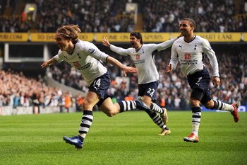 LONDON - MARCH 21:  Luka Modric (#14) of Tottenham celebrates after he scores the first goal of the game during the Barclays Premier League match between Tottenham Hotspur and Chelsea at White Hart Lane on March 21, 2009 in London, England.  (Photo by Sha