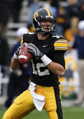 IOWA CITY, IOWA - NOVEMBER 8: Quarterback Ricky Stanzi #12 of the Iowa Hawkeyes looks down field for a receiver during the first quarter of play against the Penn State Nittany Lions at Kinnick Stadium on November 8, 2008 in Iowa City, Iowa. Iowa defeated 