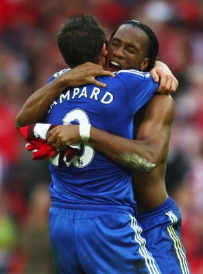 LONDON - APRIL 18: Didier Drogba and Frank Lampard of Chelsea celebrate victory after the FA Cup sponsored by E.ON Semi Final match between Arsenal and Chelsea at Wembley Stadium on April 18, 2009 in London, England.  (Photo by Jamie McDonald/Getty Images