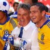 LONDON, ENGLAND - MAY 30:  Chelsea manager Guus Hiddink and winning goalscorer Frank Lampard  celebrate with the trophy after the FA Cup sponsored by E.ON Final match between Chelsea and Everton at Wembley Stadium on May 30, 2009 in London, England.  (Pho