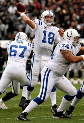 OAKLAND, CA - DECEMBER 16:  Quarterback Peyton Manning #18 of the Indianapolis Colts throws a pass behind the blocks of offensive linemen Charlie Johnson #74 and Tony Ugoh #67 against the Oakland Raiders at McAfee Coliseum December 16, 2007 in Oakland, Ca