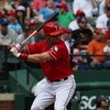 ARLINGTON, TX - APRIL 19:  Third baseman Michael Young #10 of the Texas Rangers at bat on April 19, 2009 at Rangers Ballpark in Arlington, Texas.  (Photo by Ronald Martinez/Getty Images)