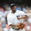 NEW YORK - MAY 24:  CC Sabathia #52 of the New York Yankees pitches against the Philadelphia Phillies on May 24, 2009 at Yankee Stadium in the Bronx borough of New York City.  (Photo by Nick Laham/Getty Images)